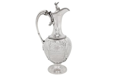 Lot 427 - Staffordshire Rifle Volunteers - A Victorian sterling silver claret jug ewer, Birmingham 1862 by Gough and Silvester