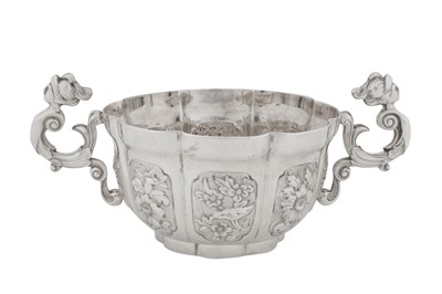 Lot 394 - A George V sterling silver replica twin handled cup, London 1912 by Carrington and Co