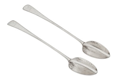 Lot 345 - A pair of George III sterling silver straining spoons, London 1789 by Thomas Wallis
