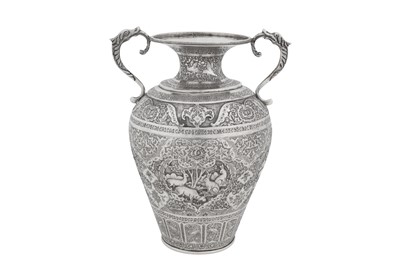 Lot 244 - An early to mid-20th century Persian (Iranian) unmarked silver twin handled vase, Isfahan circa 1930-40