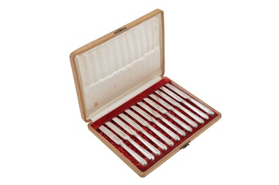 Lot 272 - A cased set of twelve Nicholas II late 19th century Russian 84 zolotnik silver tea knives, Moscow 1892 by BC, possibly Vasily Sergeevich Sikachev (est. 1883)