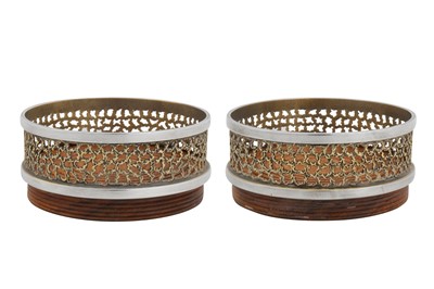Lot 369 - A pair of Elizabeth II modernist parcel gilt sterling silver wine coasters, London 1982 by Stuart Devlin (1931-2018)