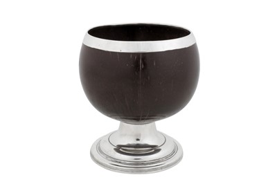 Lot 472 - A George III provincial sterling silver mounted coconut cup, Newcastle circa 1800 by John Robertson (active alone 1797-1801)