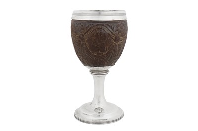 Lot 453 - A George III sterling silver mounted coconut cup, London 1804 by John Troby (first reg. 29th of March 1787)