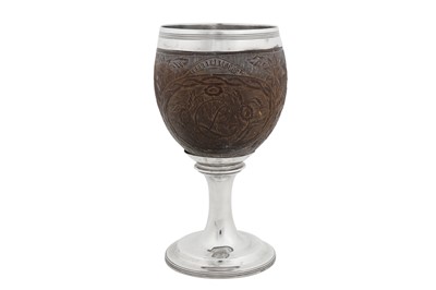 Lot 454 - A George III sterling silver mounted coconut cup, London 1804 by John Troby (first reg. 29th of March 1787)