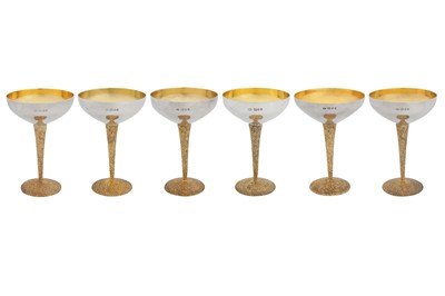 Lot 370 - A set of six Elizabeth II modernist parcel gilt sterling silver champagne coups, London 1970 / 71 by Stuart Devlin (1931-2018)
