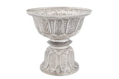 Lot 221 - A 20th century Tibetan unmarked silver standing bowl