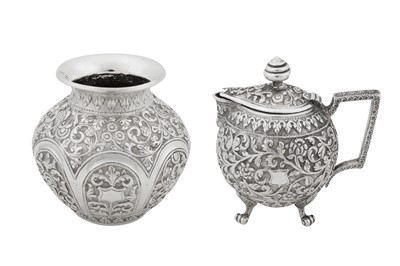 Lot 146 - A late 19th century Anglo – Indian unmarked silver covered milk jug, Cutch circa 1890