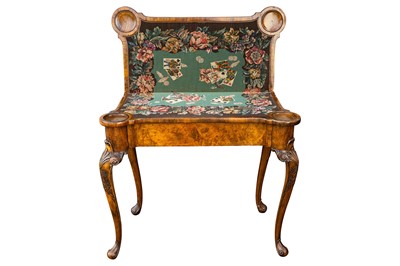 Lot 60 - A George II style figured walnut games table, early 20th century