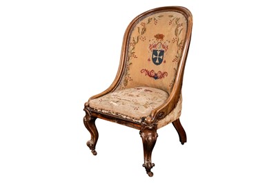 Lot 45 - A Victorian carved walnut nursing chair, circa 1850
