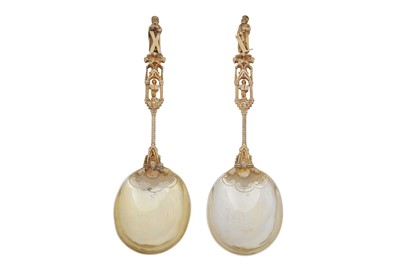 Lot 332 - A large pair of Edwardian silver gilt apostle fruit serving spoons, London 1903/4 by Wakely and Wheeler