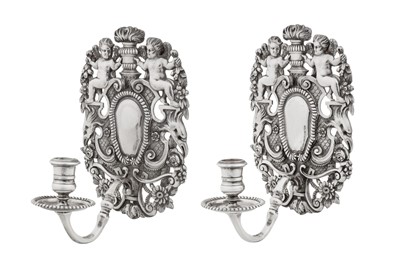 Lot 382 - A pair of Elizabeth II sterling silver wall sconces (lights), London 1965 by Wakley and Wheeler