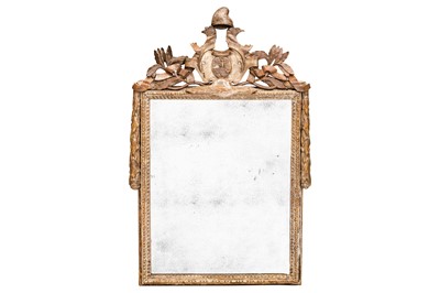 Lot 10 - A Louis XVI French giltwood armorial wall mirror