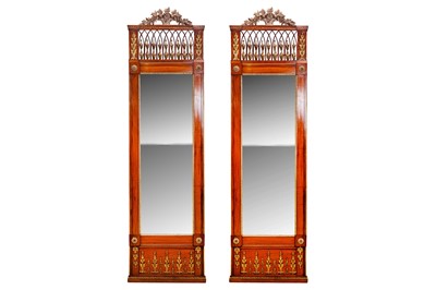 Lot 12 - A pair of 19th century walnut and parcel gilt pier glasses