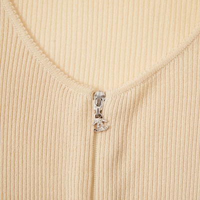 Lot 136 - Chanel Beige Ribbed Knit Twin Set - Size 42