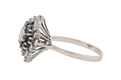 Lot 65 - A diamond and sapphire ring