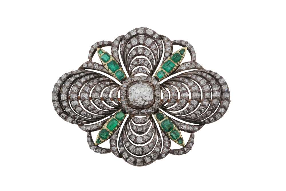 20 - An emerald and diamond brooch, circa 1910