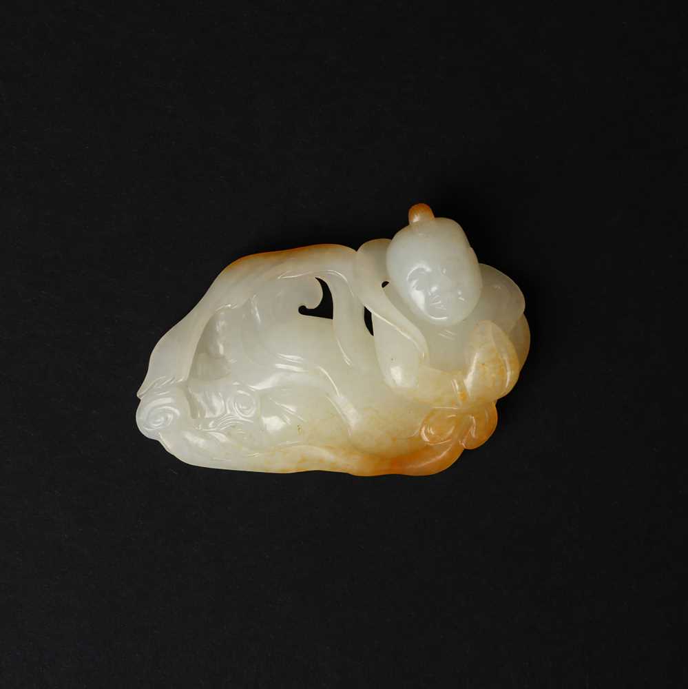 98 - A Chinese pale-celadon and russet jade 'boy' carving, Qing dynasty