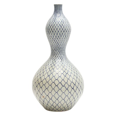 Lot 10 - A Japanese Arita blue and white 'fishnet' vase, Edo period, 18th century