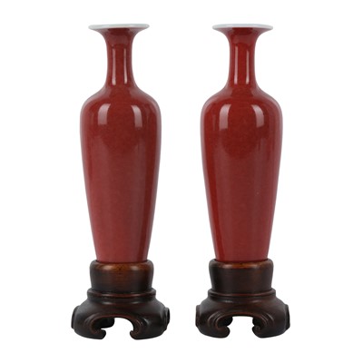 Lot 120 - A pair of Chinese peachbloom-glazed 'amphora' vases, liuye zun, 20th century