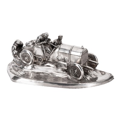 Lot 157 - An early 20th Century silver plated spelter racing car desk stand