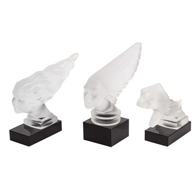 Lot 445 - Three frosted glass car mascots, on integrated plinths, in the manner of Lalique
