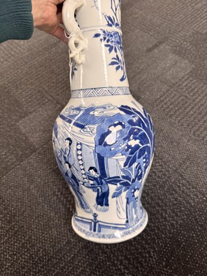 Lot 18 - A rare Chinese blue and white 'Yuanyang Tao' twin-handled vase, Qing dynasty, Kangxi period