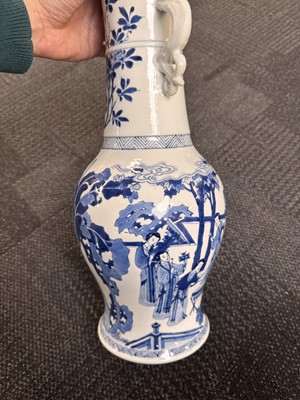 Lot 18 - A rare Chinese blue and white 'Yuanyang Tao' twin-handled vase, Qing dynasty, Kangxi period