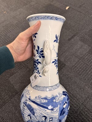 Lot 18 - A rare Chinese blue and white 'Yuanyang Tao' twin-handled vase, Qing dynasty, Kangxi period
