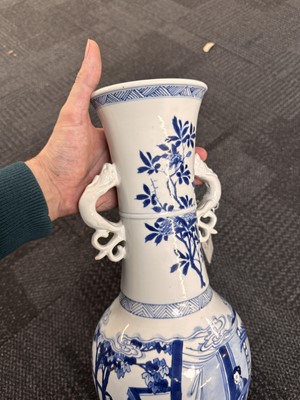 Lot 18 - A rare Chinese blue and white 'Yuanyang Tao' twin-handled vase, Qing dynasty, Kangxi period