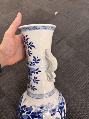 Lot 18 - A rare Chinese blue and white 'Yuanyang Tao' twin-handled vase, Qing dynasty, Kangxi period