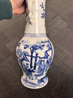 Lot 18 - A rare Chinese blue and white 'Yuanyang Tao' twin-handled vase, Qing dynasty, Kangxi period