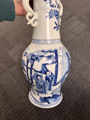 Lot 18 - A rare Chinese blue and white 'Yuanyang Tao' twin-handled vase, Qing dynasty, Kangxi period
