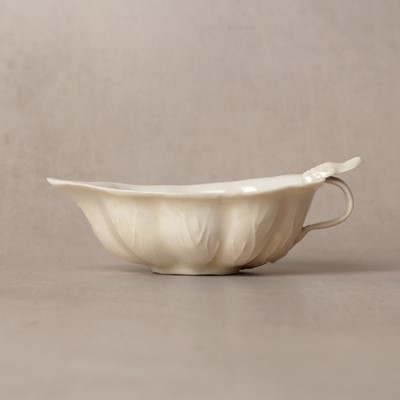 Lot 33 - A fine Chinese Dehua 'lotus' brush washer, Qing dynasty, Kangxi period