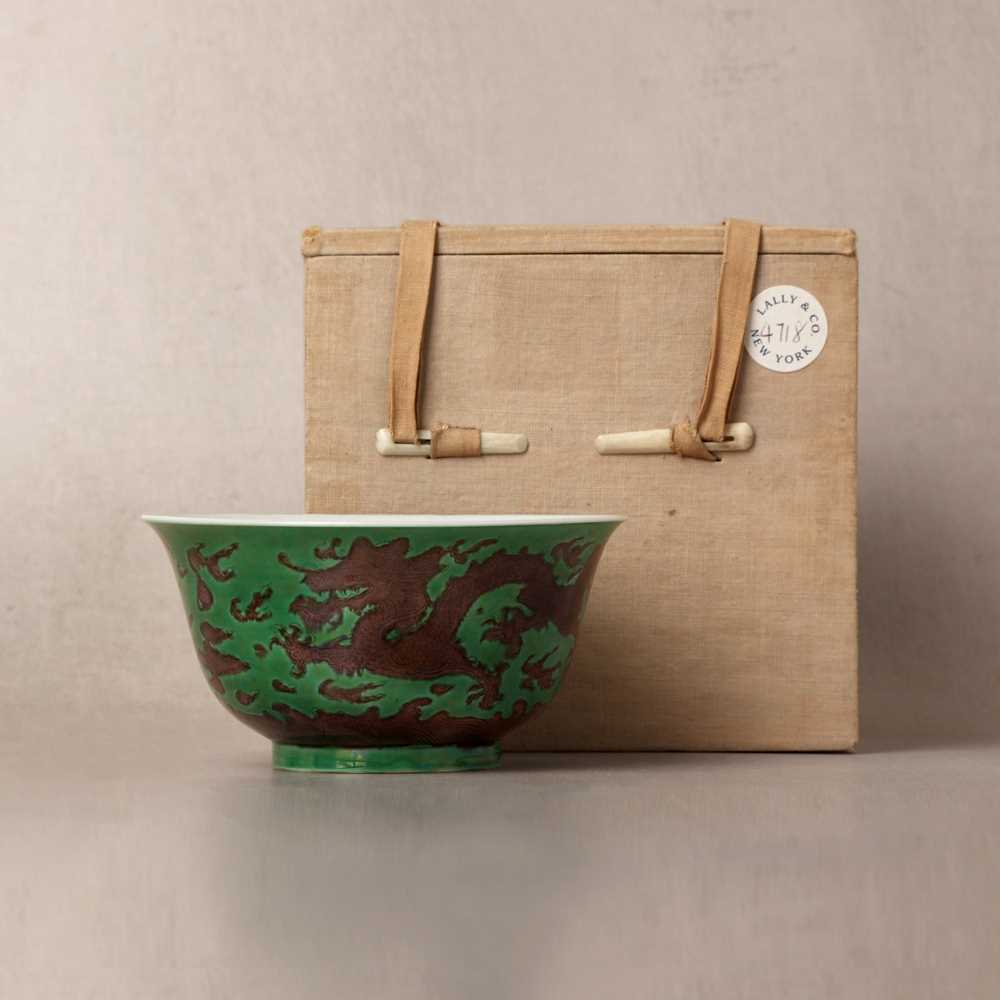 22 - ♦ A rare Chinese Imperial aubergine-enamelled 'dragon' bowl, Qing dynasty, Kangxi mark and period