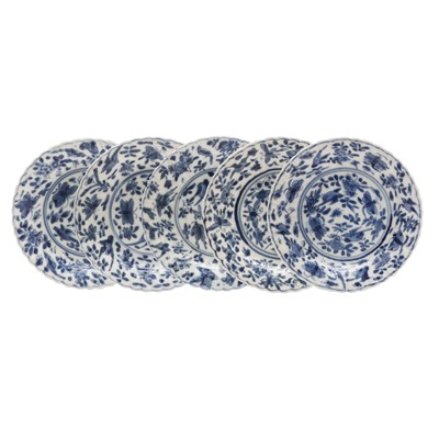 Lot 57 - Five Chinese blue and white 'birds and butterflies' dishes, Qing dynasty, Kangxi period