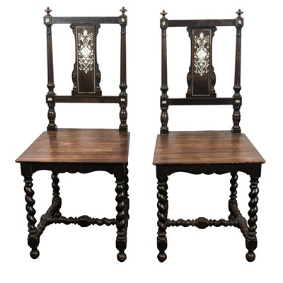 Lot 109 - A pair of Italian Renaissance Revival ivory inlaid ebonised hall chairs