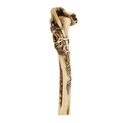 Lot 58 - A Japanese sashi-netsuke of a scepter in the style of Isshosai Hakumin, Asakusa, Meiji period