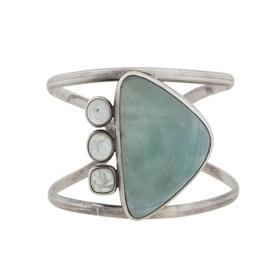 Lot 5 - An aquamarine and rock crystal cuff bangle