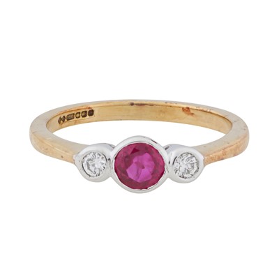 Lot 165 - A ruby and diamond three-stone ring, circa 1999