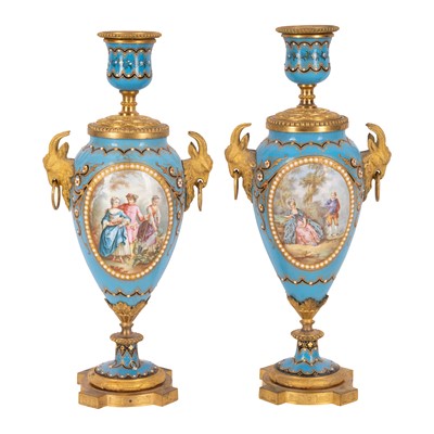 Lot 8 - A pair of Sevres style enameled ormolu lidded vases
