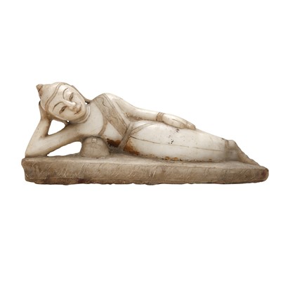 Lot 320 - A Burmese parcel-gilt marble figure of reclining Buddha, 19th century