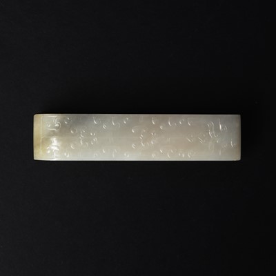 Lot 91 - A Chinese archaistic white jade 'taotie' belt hook, Qing dynasty, 18th/19th century
