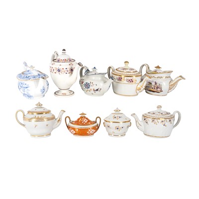 Lot 335 - A group of seven English porcelain teapots and two sucriers, late 18th / early 19th century