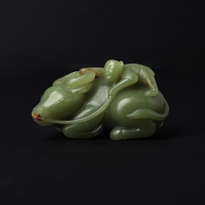 Lot 102 - A Chinese green jade 'boy and ox' carving, 20th century