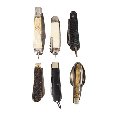 Lot 225 - A group of six multi-tool knives