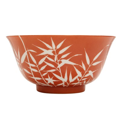 Lot 175 - A Chinese reverse-decorated coral-glazed 'bamboo' bowl, 20th century
