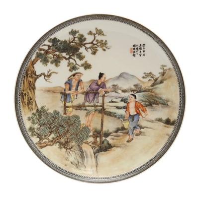 Lot 169 - A Chinese famille-rose 'figural' dish, 20th century, dated 1943, signed Wang Xiliang