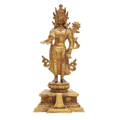 Lot 318 - A Nepalese gilt-bronze figure of Padmapani Lokeshvara, 19th / 20th Century