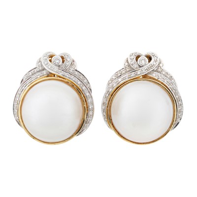 Lot 233 - A pair of mabé pearl and diamond earrings